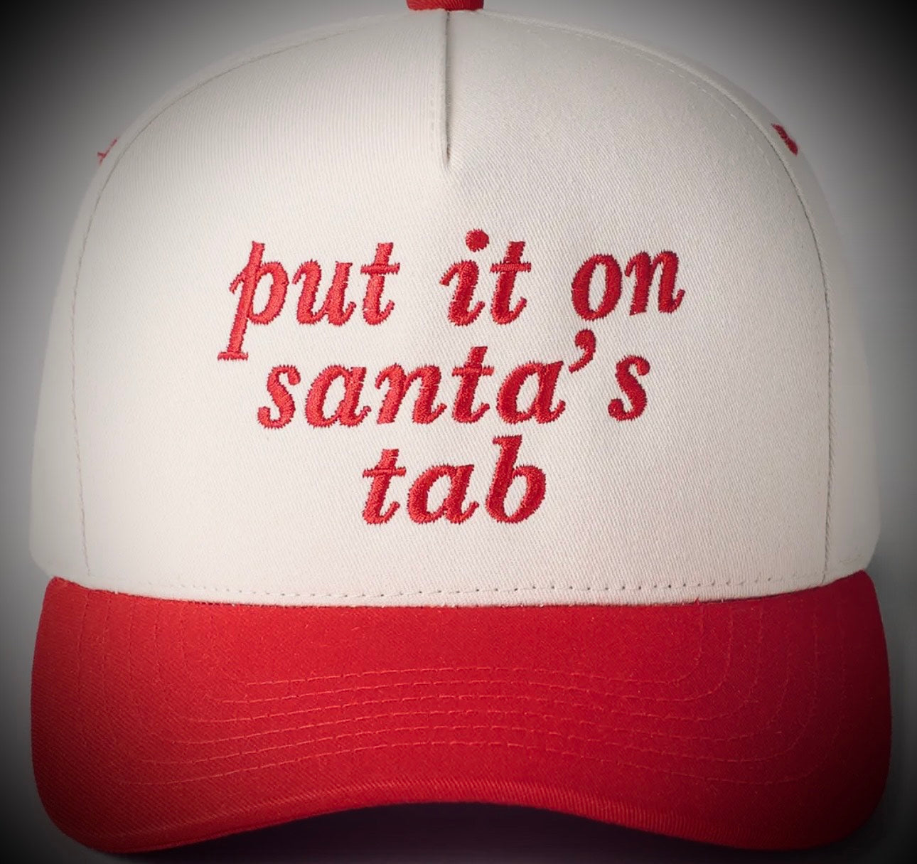 Put it on Santas tab Trucker Hat